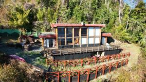 a house on the side of a hill at casa en caburgua in Caburgua