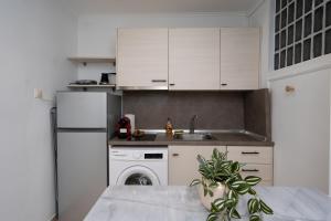 Η κουζίνα ή μικρή κουζίνα στο MarinTheo House