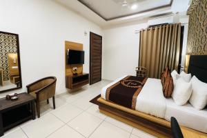 TV a/nebo společenská místnost v ubytování Hotel JMK - Managed by JMD Group