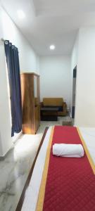 Ένα ή περισσότερα κρεβάτια σε δωμάτιο στο Blue home stay +1 φωτογραφίες