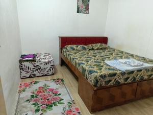Katil atau katil-katil dalam bilik di HOMESTAY BUDGET ALOR SETAR +28 gambar
