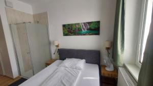 Ένα ή περισσότερα κρεβάτια σε δωμάτιο στο Appartment Top 6 - Easy