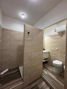 a bathroom with a shower stall and a toilet at B&B Galileo Galilei in Caserta +21 photos