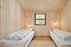 Ένα ή περισσότερα κρεβάτια σε δωμάτιο στο JB126-Fjerritslev-Tyttebaerstien-48