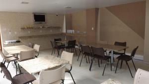 Pousada Café Com Leitte的休息区