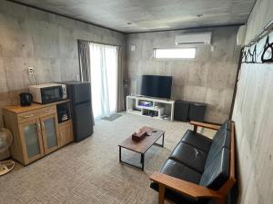 TV a/nebo společenská místnost v ubytování シーサイドサーフandサウナ九十九里