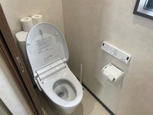 Koupelna v ubytování シーサイドサーフandサウナ九十九里 + 17 fotografií