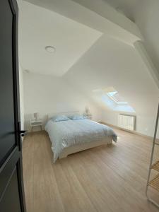 Katil atau katil-katil dalam bilik di Appartement en Duplex en centre d'Isbergues +10 gambar