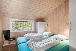 Ένα ή περισσότερα κρεβάτια σε δωμάτιο στο JB133-Fjerritslev-Blabaerstien-35