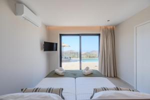 Postel nebo postele na pokoji v ubytování Filade luxury villas + 50 fotografií