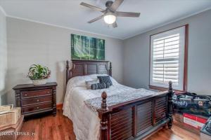 Ένα ή περισσότερα κρεβάτια σε δωμάτιο στο Jacksonville Hideaway Modern Pet-Friendly
