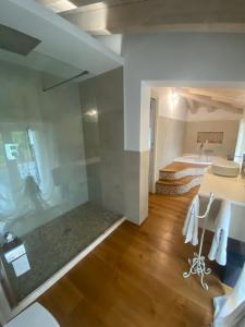 a bathroom with a table and a sink in a room at Villa Sabina in Lido di Camaiore +31 photos