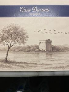 ein Bild einer Zeichnung eines Schlosses und Vögel in der Unterkunft Casa Burano in Capalbio