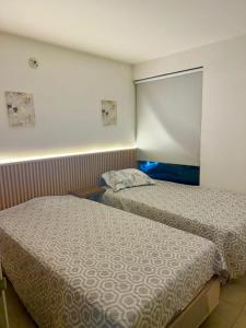Una cama o camas en una habitación de Le Parc 40 - Vista, Estilo y Ubicación