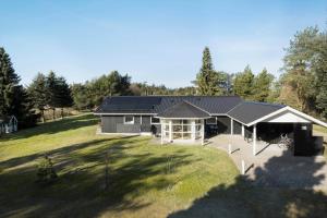 an aerial view of a house with a large yard at JB195-Fjerritslev-Bogevej-36 in Fjerritslev