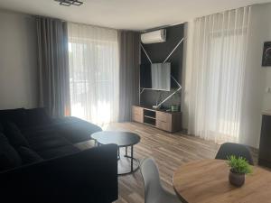 Χώρος καθιστικού στο Duży Apartament 3 pokoje Park City