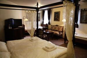 Voodi või voodid majutusasutuse Hotel Koruna Prachatice toas