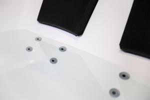 a close up of three pieces of black paper at LES BULLES DE MONA - Chic - Spa - Clim in Lyon