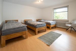 Ένα ή περισσότερα κρεβάτια σε δωμάτιο στο Ferienhaus Kronenburg