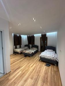 Ένα ή περισσότερα κρεβάτια σε δωμάτιο στο Guesthouse Dritan Selimaj