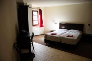 Voodi või voodid majutusasutuse Hotel Koruna Prachatice toas