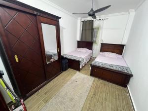 Postel nebo postele na pokoji v ubytování Alamein