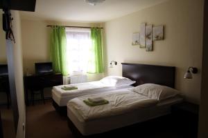 Voodi või voodid majutusasutuse Hotel Koruna Prachatice toas