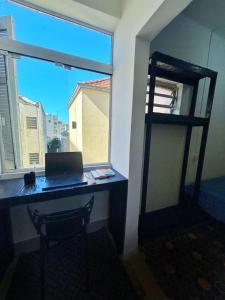 Μια τηλεόραση ή/και κέντρο ψυχαγωγίας στο Bah Coliving Gurias