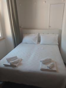 Postel nebo postele na pokoji v ubytování Cody's Apartment + 4 fotografie