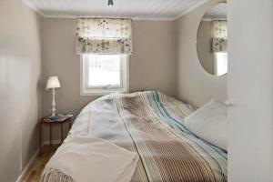 Ένα ή περισσότερα κρεβάτια σε δωμάτιο στο HAL314-Unnaryd-Ropareudden-5