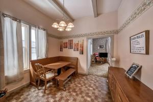 a dining room with a table and a desk at 4BR Near Ski Cooper Mineral Belt - Pet Friendly in Leadville