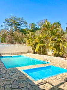 Bazén v ubytování Recanto da Coruja nebo v jeho okolí