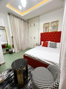Postel nebo postele na pokoji v ubytování Service Apartment