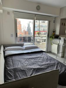 En eller flere senge i et værelse på Dto nueva cordoba