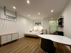 En eller flere senge i et værelse på Ferienwohnung an der Roseninsel