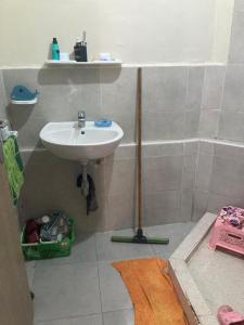a bathroom with a sink and a bath tub at Blue Wave Apartments Anza in Agadir +3 photos