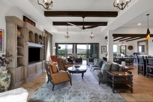 a living room with a couch and a table at Hacienda - A Birdy Vacation Rental in San Antonio
