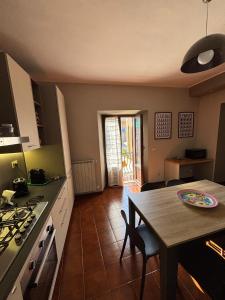 Kuchyň nebo kuchyňský kout v ubytování Altobelli Apartment