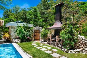 Πισίνα στο ή κοντά στο Buendía Lux Mango Suite Stylish Retreat with Pool Near Beach