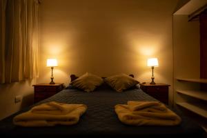 Postel nebo postele na pokoji v ubytování La Chuklla, alojamiento cerca al lago