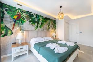 Ένα ή περισσότερα κρεβάτια σε δωμάτιο στο Villa Polina +12 φωτογραφίες