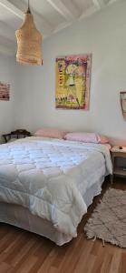 Ένα ή περισσότερα κρεβάτια σε δωμάτιο στο Rincon Ruca CHE