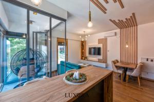 Μια τηλεόραση ή/και κέντρο ψυχαγωγίας στο LuxoraVMC Wellness & Spa Zlatibor