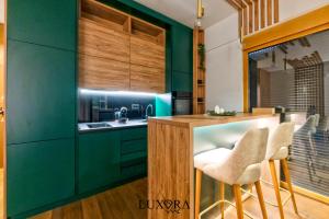 Η κουζίνα ή μικρή κουζίνα στο LuxoraVMC Wellness & Spa Zlatibor