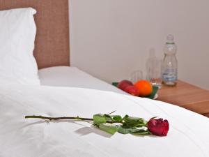 Posteľ alebo postele v izbe v ubytovaní Hotel Neuwirt