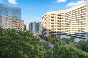 a view of a city with tall buildings at Stylish 2BR Arlington Near DC Free Parking & Gym in Arlington
