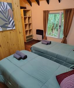 Ένα ή περισσότερα κρεβάτια σε δωμάτιο στο Mi Casa Tu Casa C -Relax & Starlink-Pet friendly