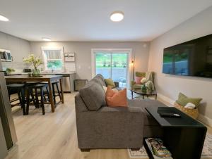 a living room with a couch and a table at Oakview Hideaway in Victoria