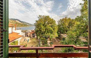 a view of the water from the balcony of a house at Gorgeous Apartment In Karlobag With Wifi in Karlobag