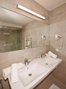 Kúpeľňa v ubytovaní Hotel Neuwirt
